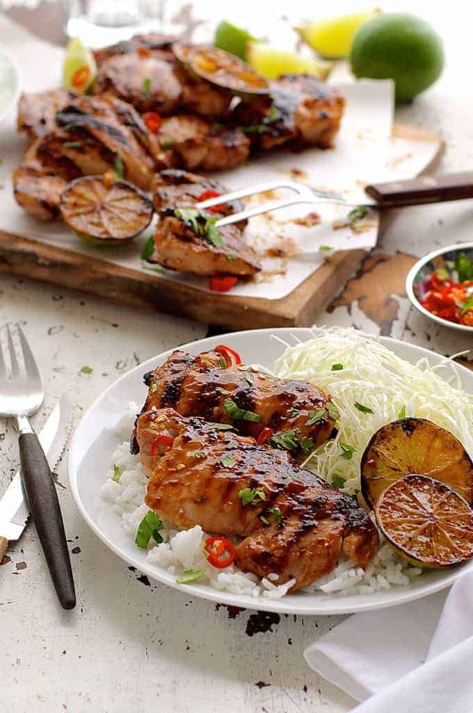 Grilled Thai Chicken (Gai Yang) served with rice and salad